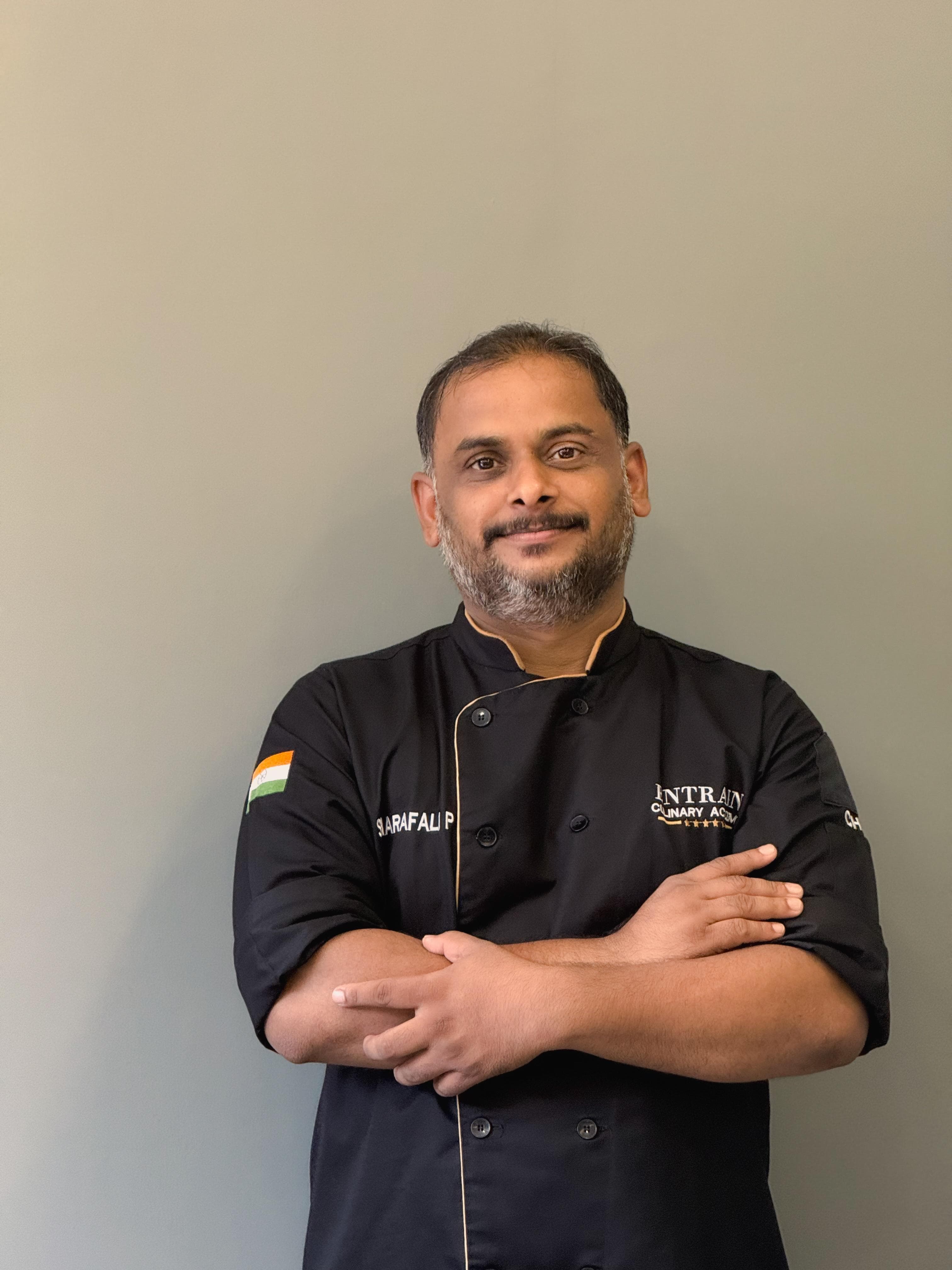 Chef Sharafali in professional chef attire