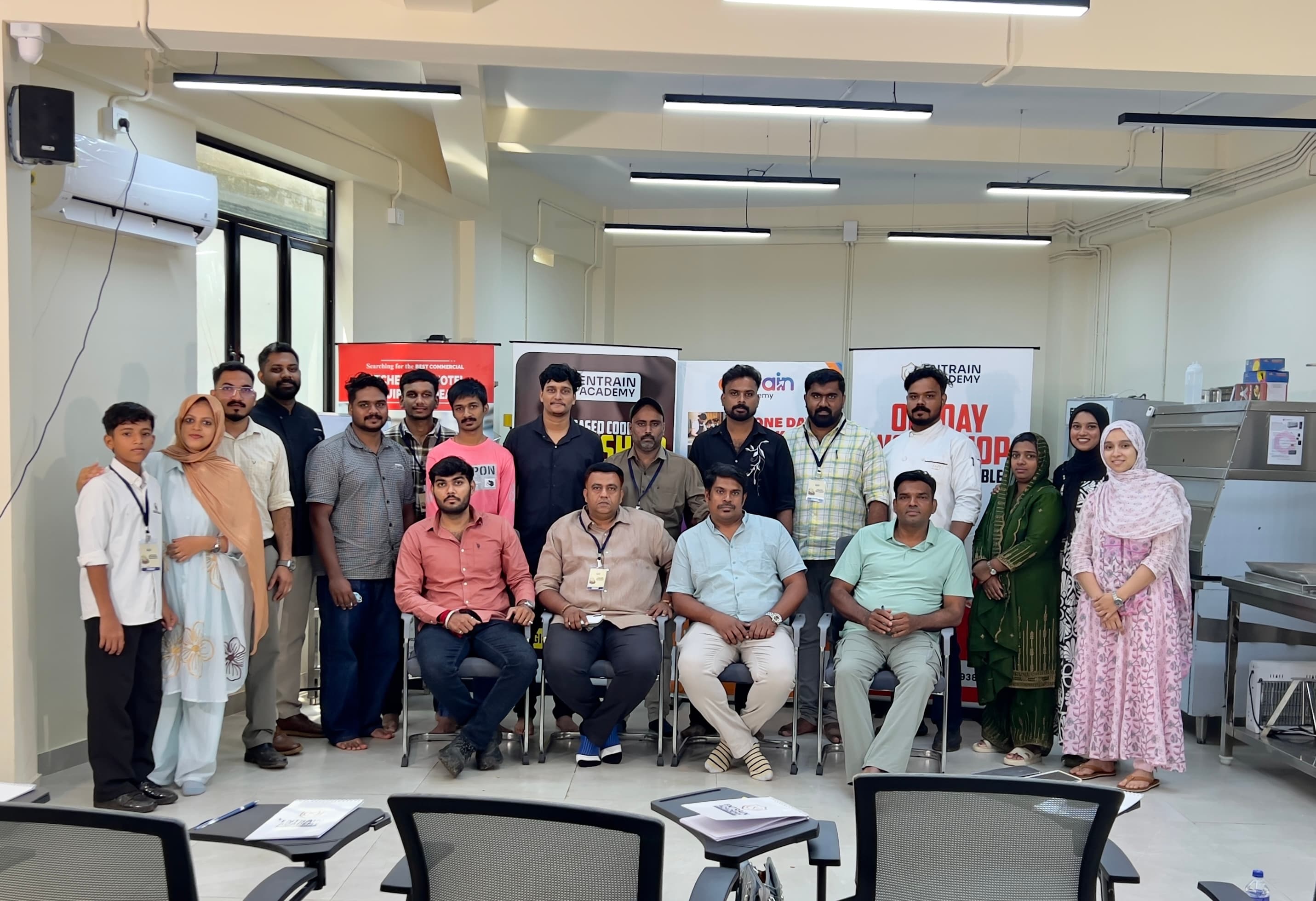 Workshop participants gathered inside the Entrain Academy classroom