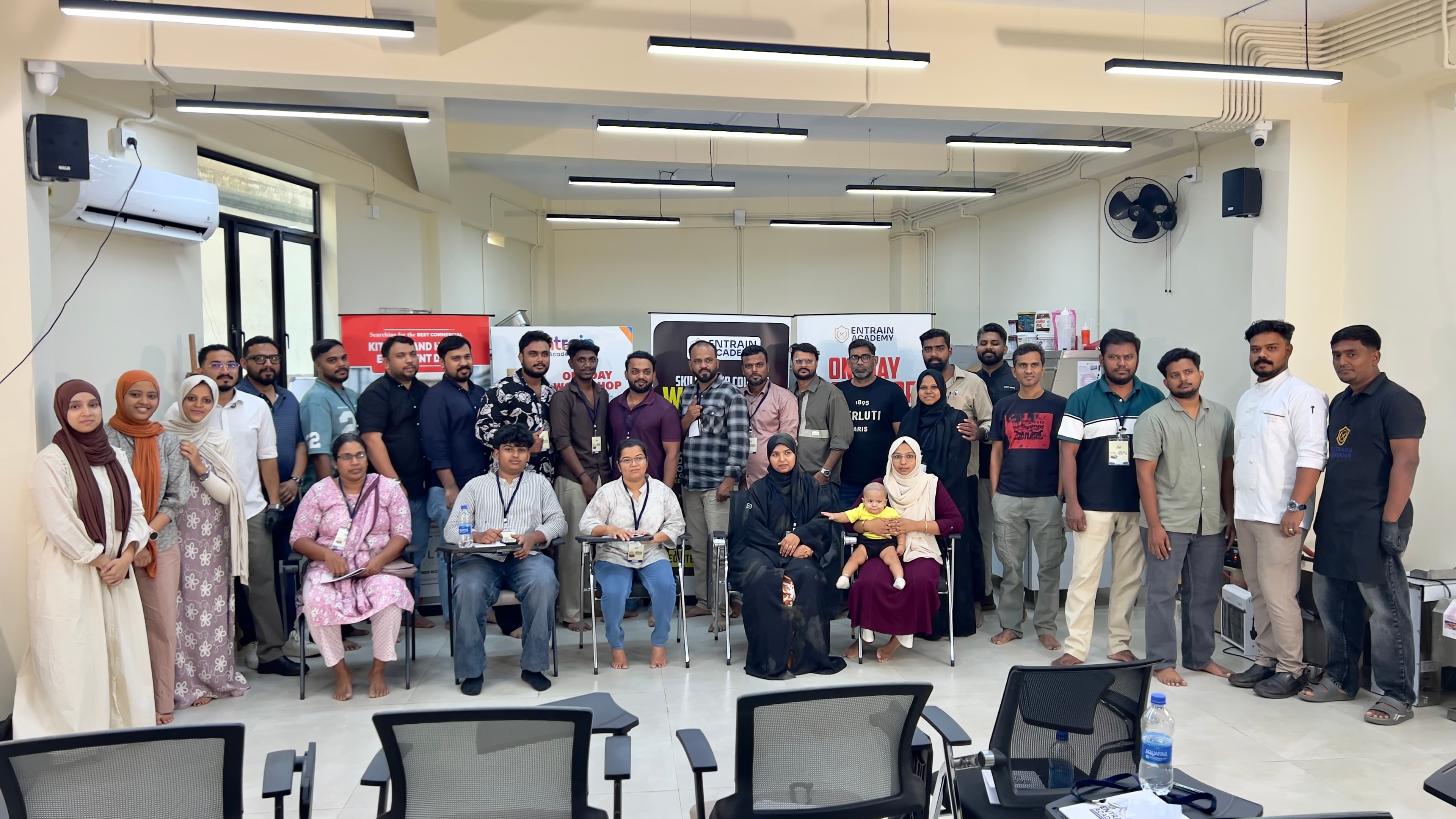 A large Entrain Academy workshop group
